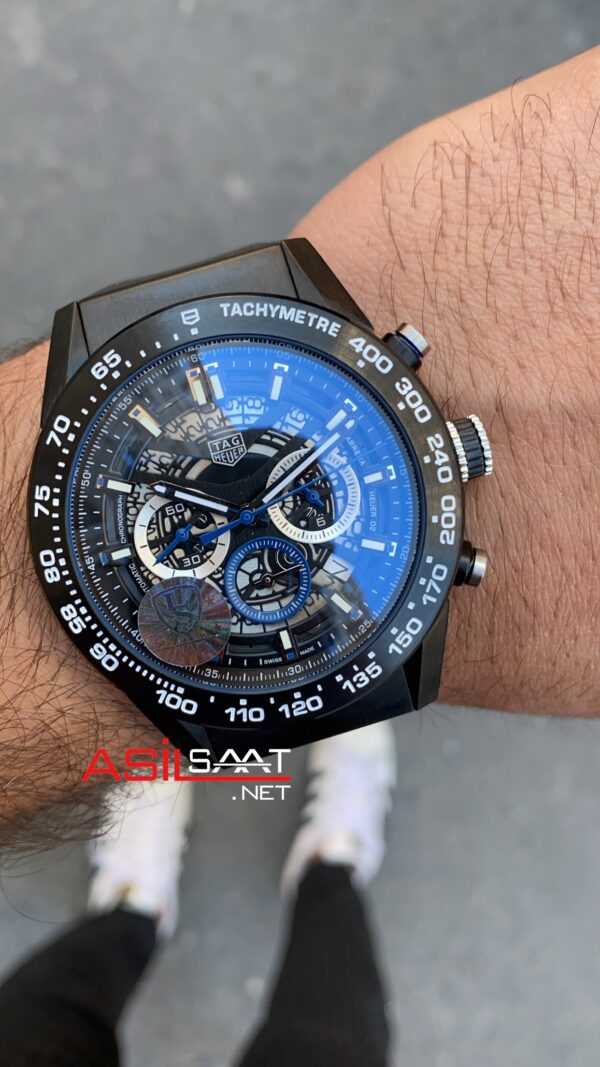TAG Heuer Carrera Calibre Heuer 02 Carbon Skeleton CBG2017 PVD Siyah TAG Heuer Carrera Calibre Heuer 02 Carbon Skeleton CBG2017 PVD Siyah