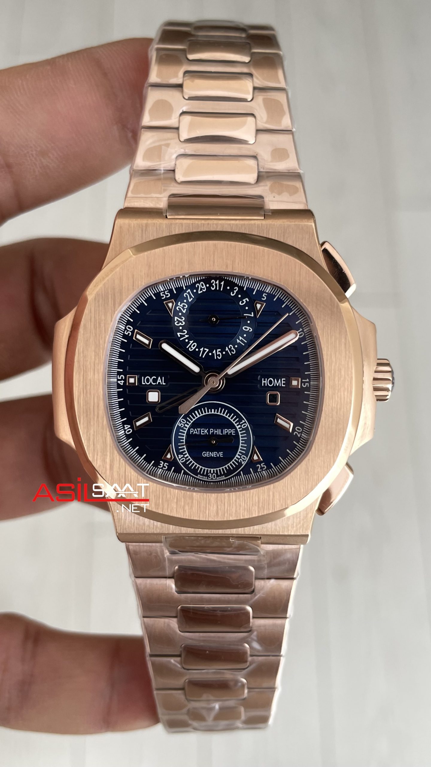Patek Philippe Nautilus Travel Time Chronograph Mavi Kadran 5990R Rose Gold Swiss ETA Saat Patek Philippe Nautilus Travel Time Chronograph Mavi Kadran 5990R Rose Gold Swiss ETA Saat