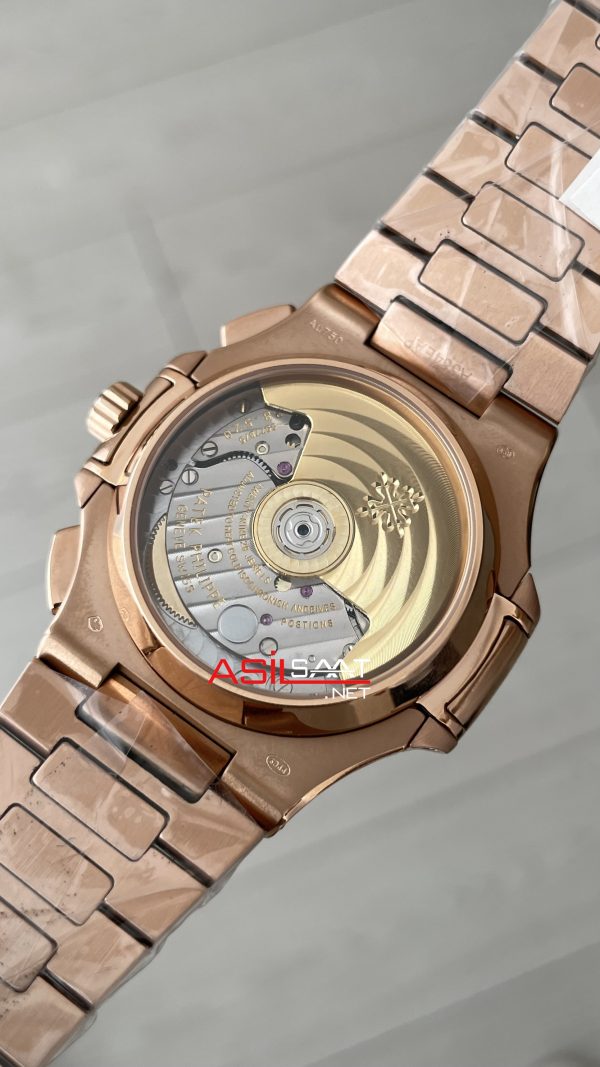 Patek Philippe Nautilus Travel Time Chronograph Mavi Kadran 5990R Rose Gold Swiss ETA Saat Patek Philippe Nautilus Travel Time Chronograph Mavi Kadran 5990R Rose Gold Swiss ETA Saat