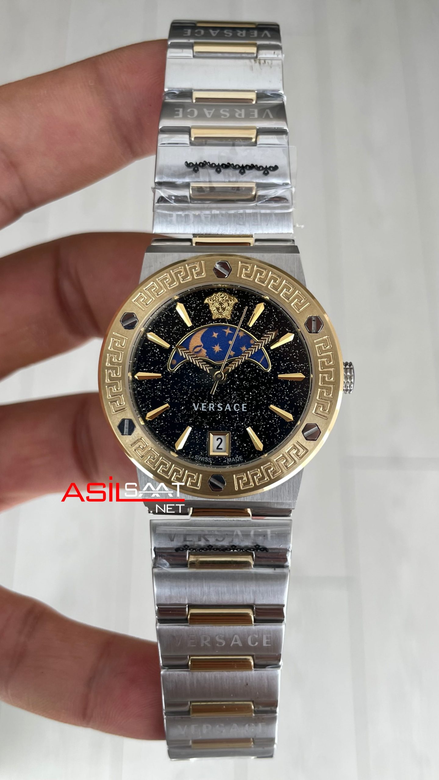 Versace Greca Logo Moonphase Siyah Kadran 38mm Silver Gold Kadın Saati Versace Greca Logo Moonphase Siyah Kadran 38mm Silver Gold Kadın Saati