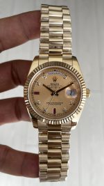 Rolex Day Date Ruby Champagne 228238 President 40mm Gold Replika Saat