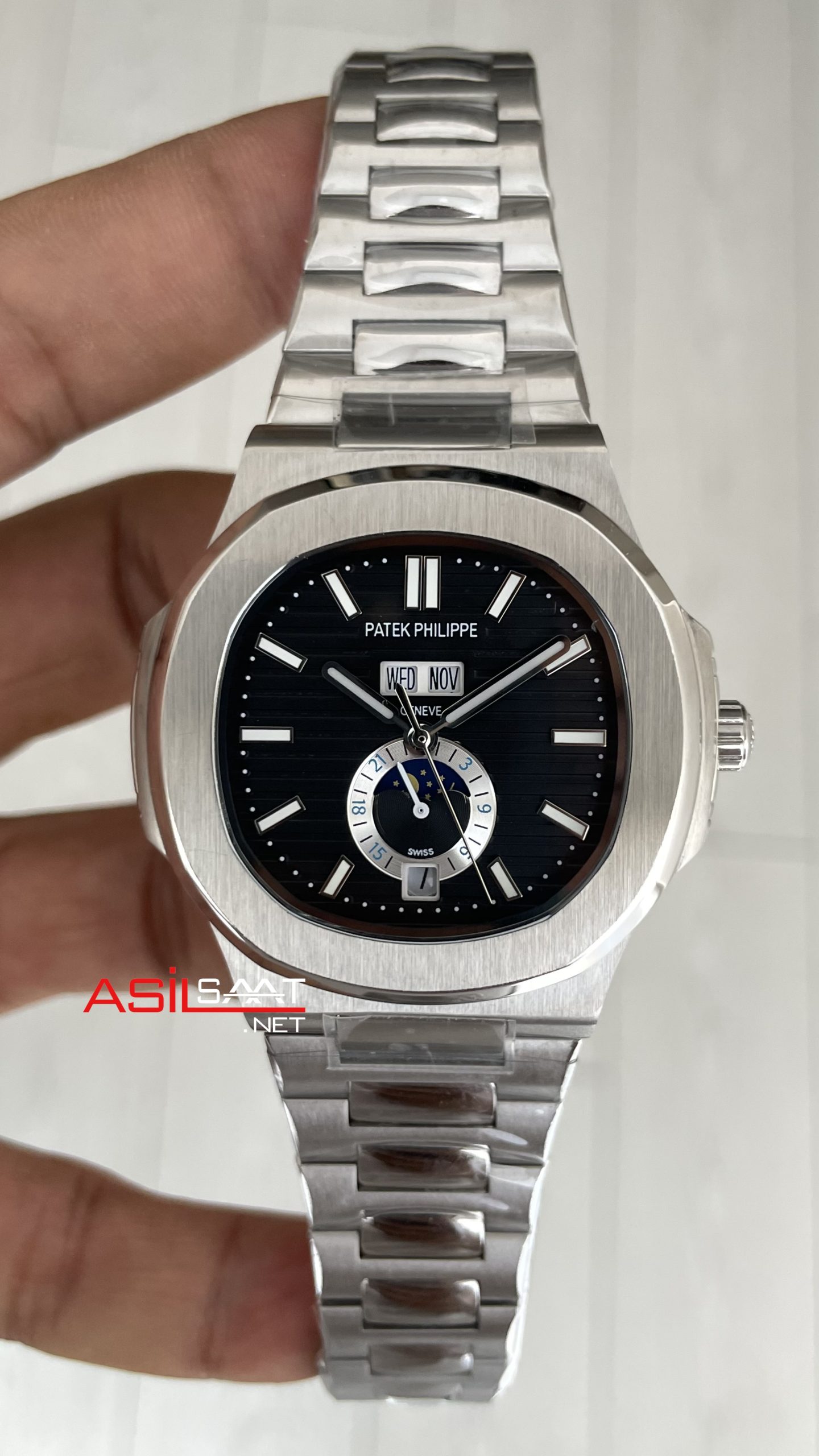 Patek Philippe Nautilus 5726 Annual Calendar Moonphase Silver Siyah Kadran Replika Saat Patek Philippe Nautilus 5726 Annual Calendar Moonphase Silver Siyah Kadran Replika Saat